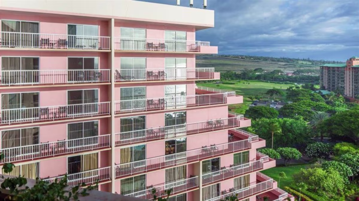 Dusty pink exterior of Hilton Vacation Club Ka'anapali Beach in Maui, Hawaii