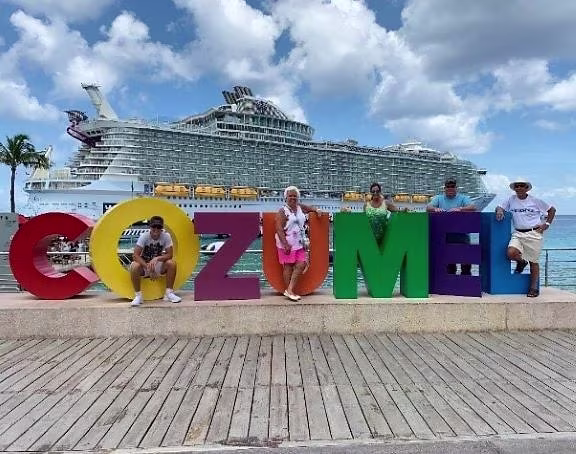 Hilton Grand Vacations Owners posing on Cozumel, Mexico, vacation. 