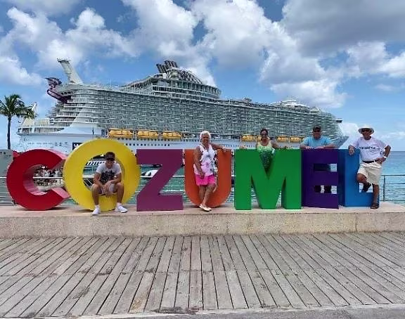 Hilton Grand Vacations Owners posing on Cozumel, Mexico, vacation. 