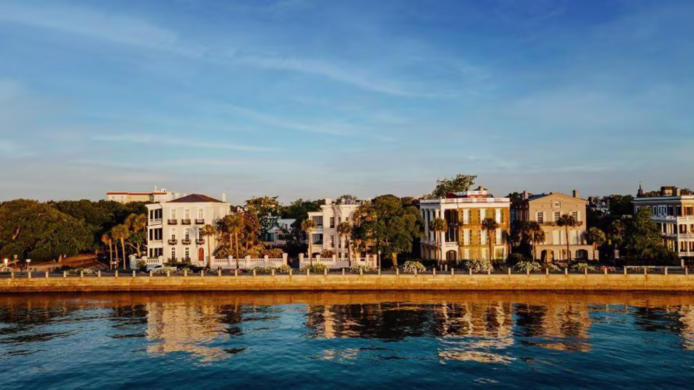 Picturesque aerial image, antebellum architecture lined waterfront, the Battery, Charleston Harbor, Charleston, South Carolina.