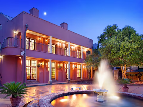 night time exterior view of Lodge Alley Inn, a Hilton Vacation Club