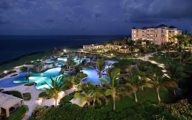 Aerial nighttime view of Hilton Grand Vacations at The Crane in Barbados. 