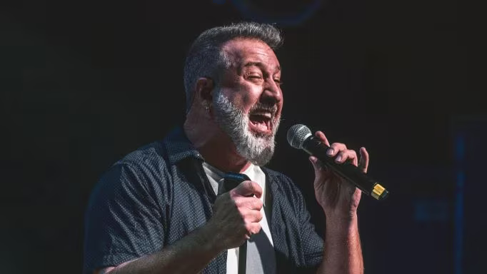 Hilton Grand Vacations Brand Ambassador Joey Fatone performing at an HGV Live! concert