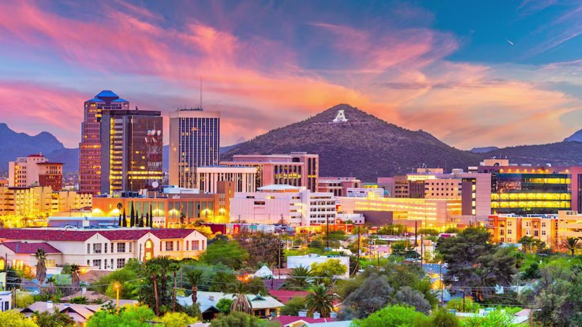 Downtown skyline of Tucson, Arizona, with Sentinel Peak at dusk