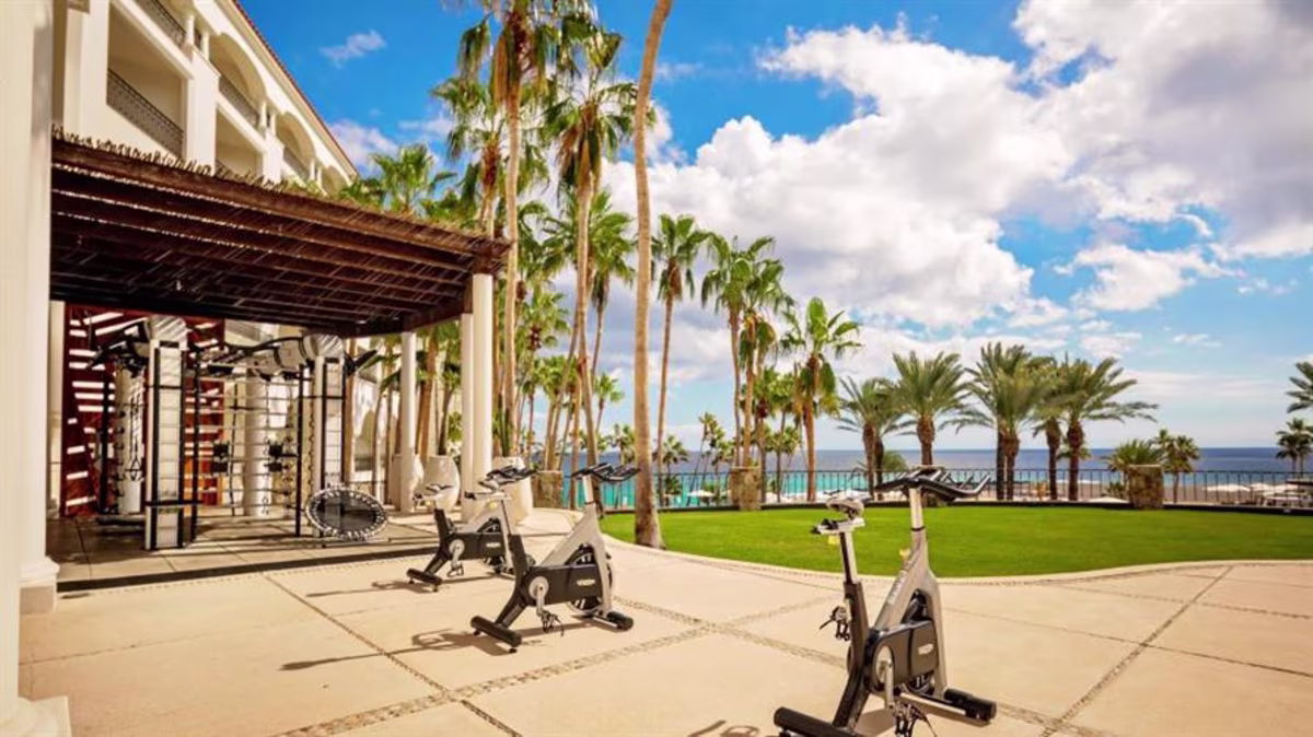 Exercise bikes on the patio of the fitness center of La Pacifica Los Cabos, a Hilton Club in Mexico