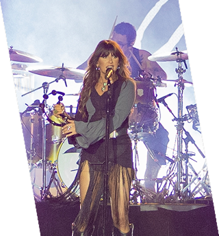woman singing on stage
