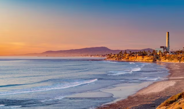 Beautiful Carlsbad coastline panorama at sunset, California. 