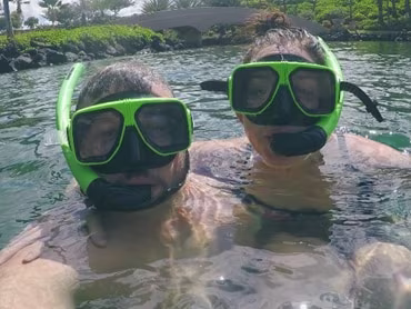 Couple snorkeling in Hawaii