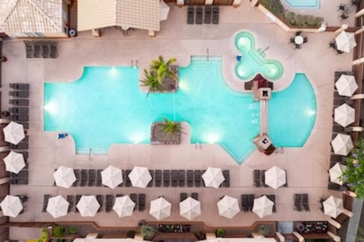 Drone shot directly overhead of the sparkling blue pool at Scottsdale Villa Mirage, a Hilton Grand Vacation Club