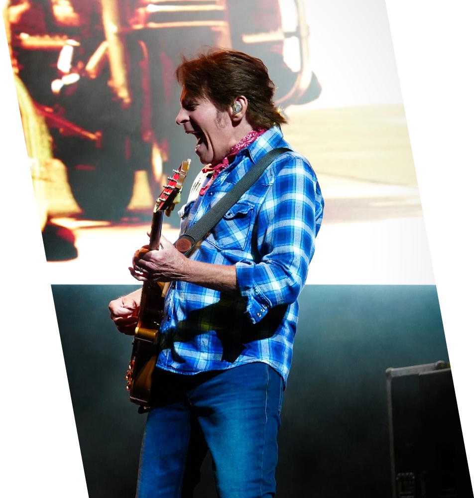 John Fogerty playing guitar