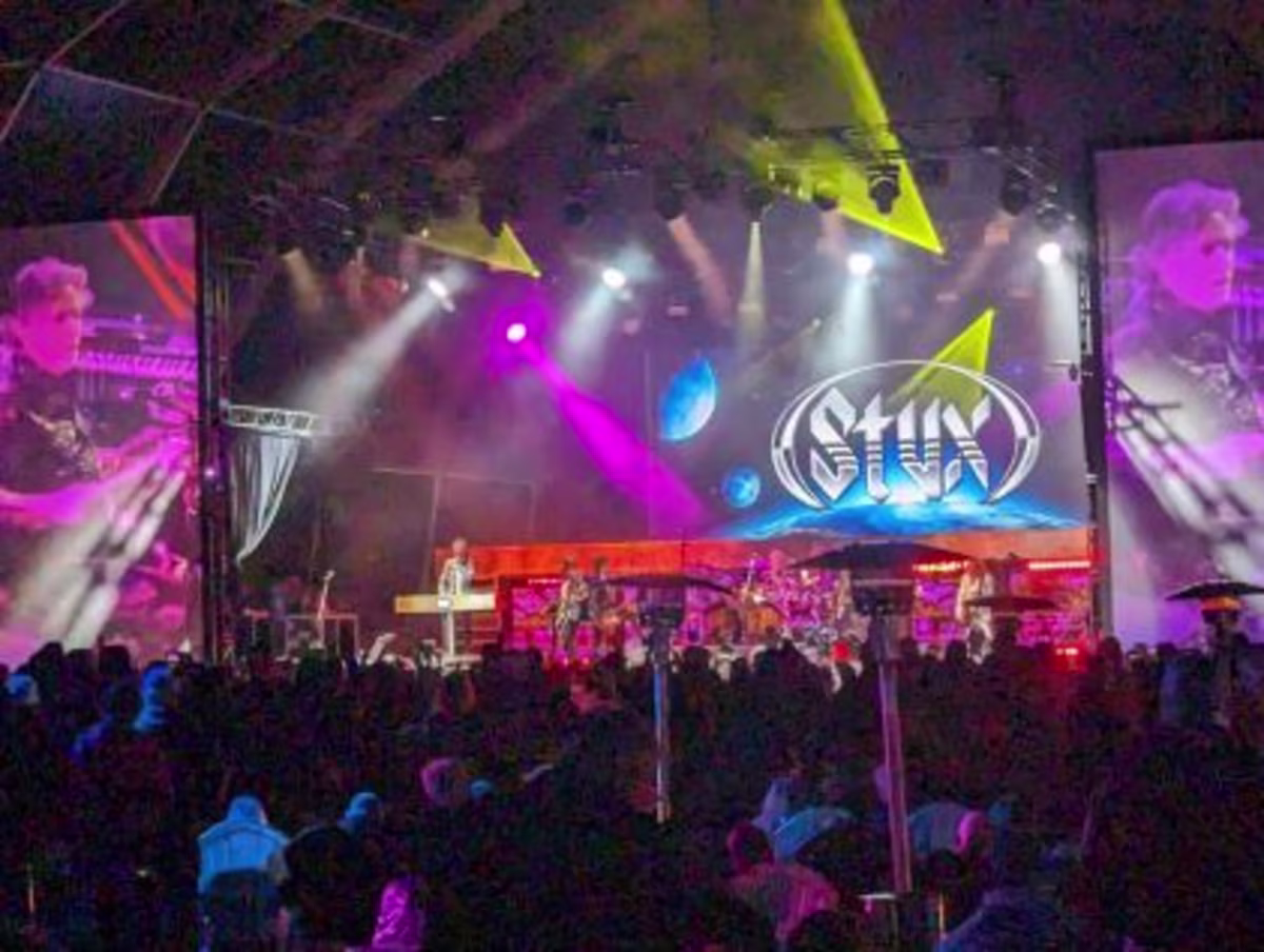 Styx performing at an evening concert at the 2024 Hilton Grand Vacations Tournament of Champions