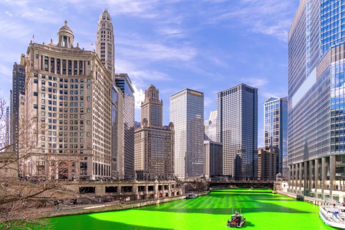 Downtown Chicago skyscrapers along the Chicago River, dyed green as part of the St. Patrick's Day festival