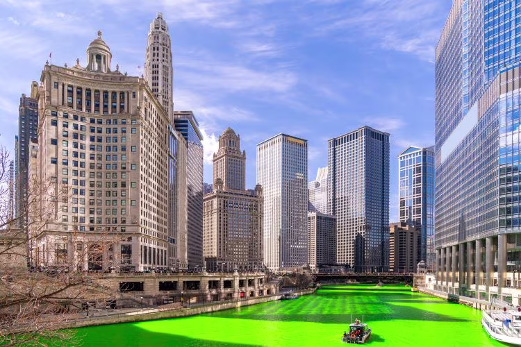 Downtown Chicago skyscrapers along the Chicago River, dyed green as part of the St. Patrick's Day festival