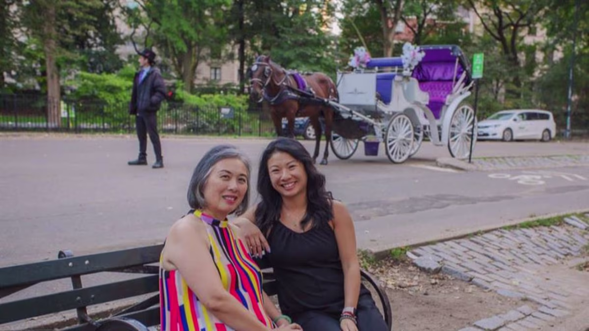 A Hilton Grand Vacations Member and her family member in New York