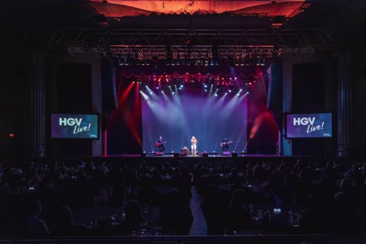 Wide shot, Carly Pearce performing on stage before HGV Live! audience, Hard Rock Orlando, FLorida.