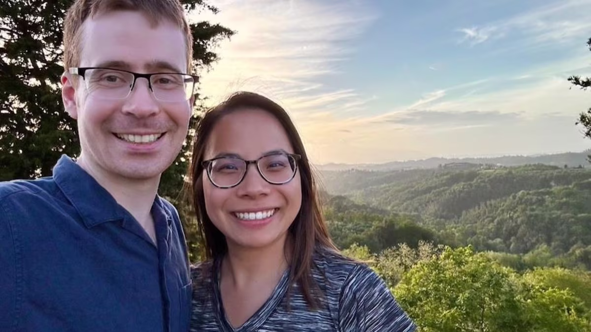 Hilton Grand Vacation Member's daughter Meagan and son-in-law Anthony pose in front a the verdant hillsides of Tuscany, Italy.