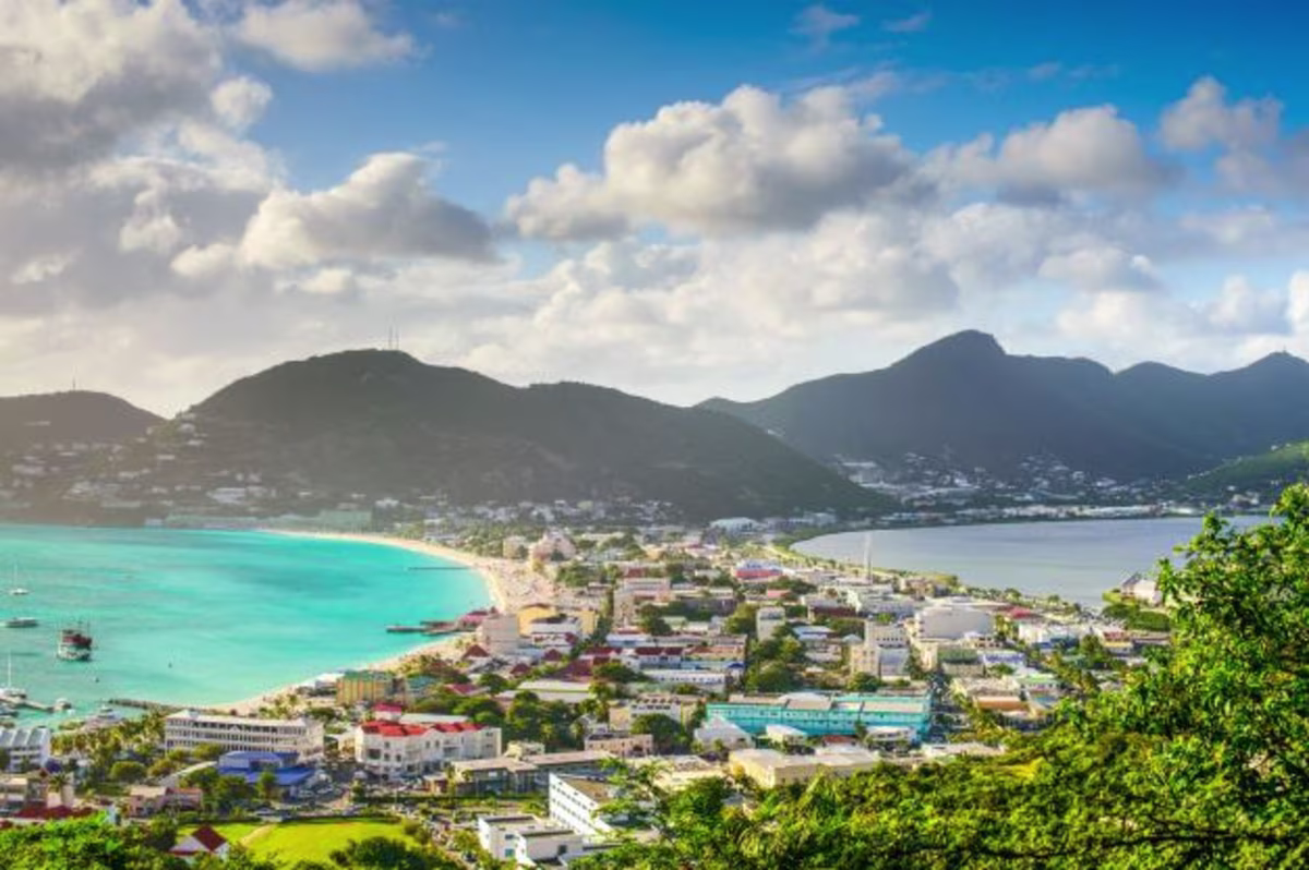 Aerial image, idyllic tropical scene, quaint village, mountains in the distance, Sint Maarten.