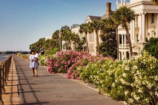 Woman and young child walking along The Battery, Charleston, South Carolina. 